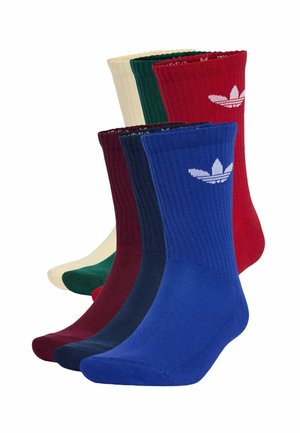 Pět párů žebrovaných ponožek v modré, námořnické modré, vínové, zelené a krémové barvě, každé s bílým logem Adidas blízko horní části.