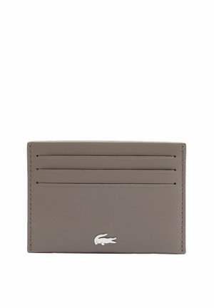 Slim gray leather cardholder with three card slots and a small silver crocodile logo at the bottom center.