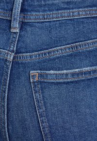 Marks & Spencer CROP - Calças de ganga de perna direita - dark indigo