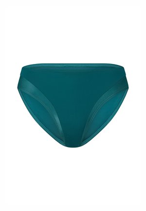 Bas de bikini teal au toucher lisse, avec une coupe taille basse et des accents latéraux. Le tissu semble extensible et confortable.