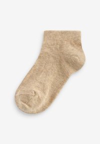 Chaussette beige à la cheville en matériau tricoté doux avec une texture lisse et un poignet en côtes. Bout arrondi et design léger.