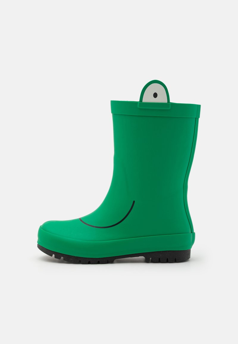 Green rubber rain boot with a smooth texture, rounded toe, and a raised back. Features a smiling face design and a white eye accent.