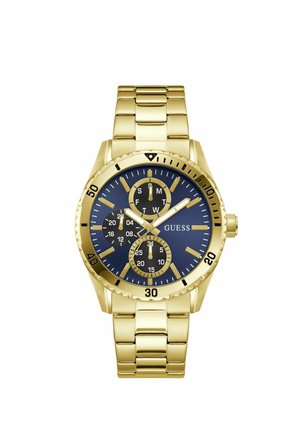 Gold metal wristwatch with blue dial, three black subdials for day, date, and 24-hour time, and gold hour markers and hands.