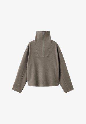 Sivý pulóver vyrobený z jemného materiálu, so stojacím golierom so zipsom, spustenými ramenami a skráteným strihom. Minimalistické švy.