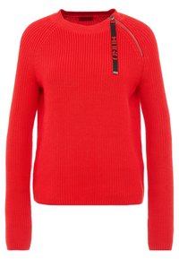 Punainen neulepusero, jossa on pyöreä pääntie, pitkät hihat ja sivuvetoketju, jossa on merkitty vetoketjutalja yksityiskohtana.