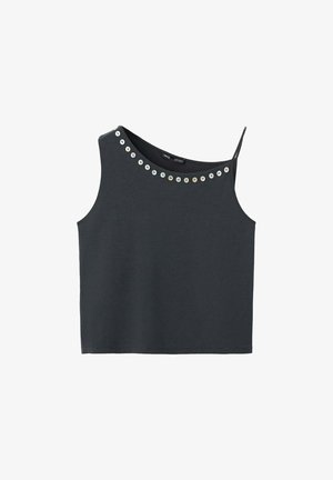 Crop top asymétrique noir sans manches avec une bretelle fine et une rangée de clous ronds argentés le long de l'encolure.