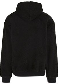 Hoodie en polaire noire avec une surface texturée, présentant une capuche, des poignets et un ourlet côtelés. Le dos est unie sans détails supplémentaires.