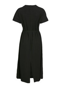 Black midi dress with short sleeves and a scoop neck. Features a textured fabric, belted waist, and a back slit for ease of movement.