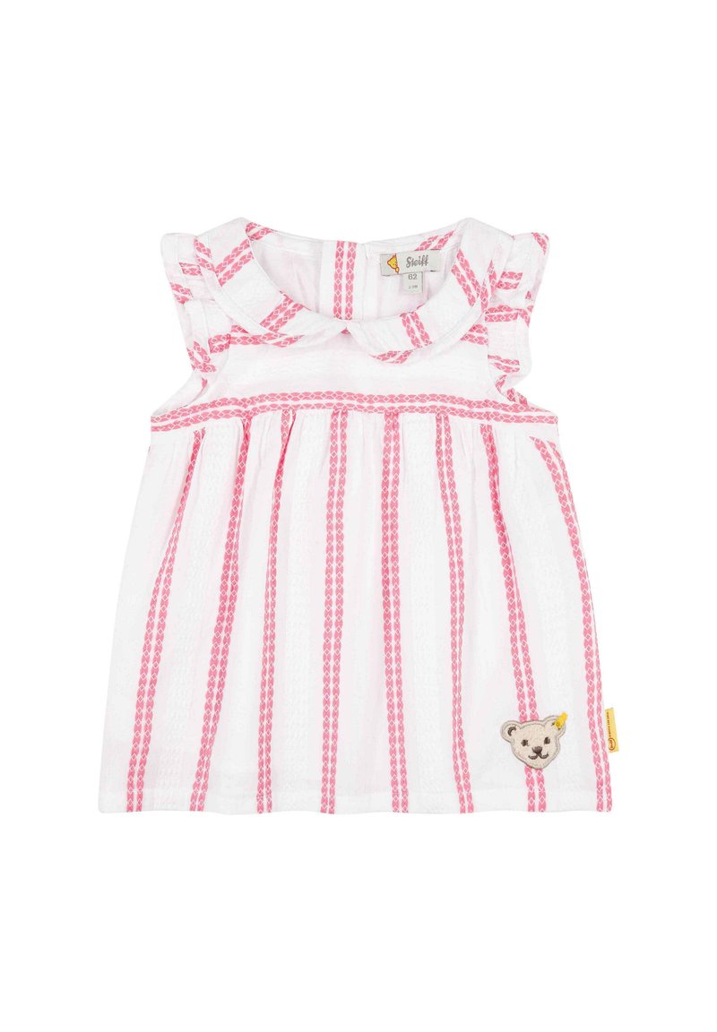 Vestido blanco sin mangas con rayas rosas, hombros con volantitos y un parche de oso en el lado izquierdo. Hecho de tela texturizada.