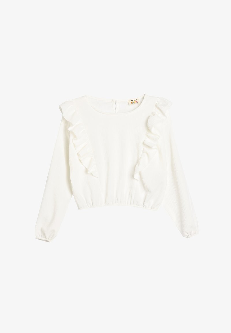 Weiße Bluse mit langen Ärmeln und Rüschendetails an den Schultern sowie einem taillierten Bund. Texturierter Stoff mit Rundhalsausschnitt und Rückenverschluss.