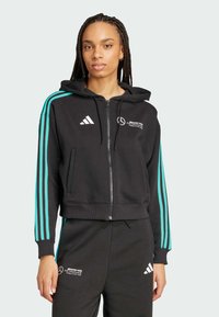 Sort zip-up hættetrøje med turquoise striber og Adidas-logo. Har en frontlynlås, justerbar hætte med snoretræk og broderede grafikker.