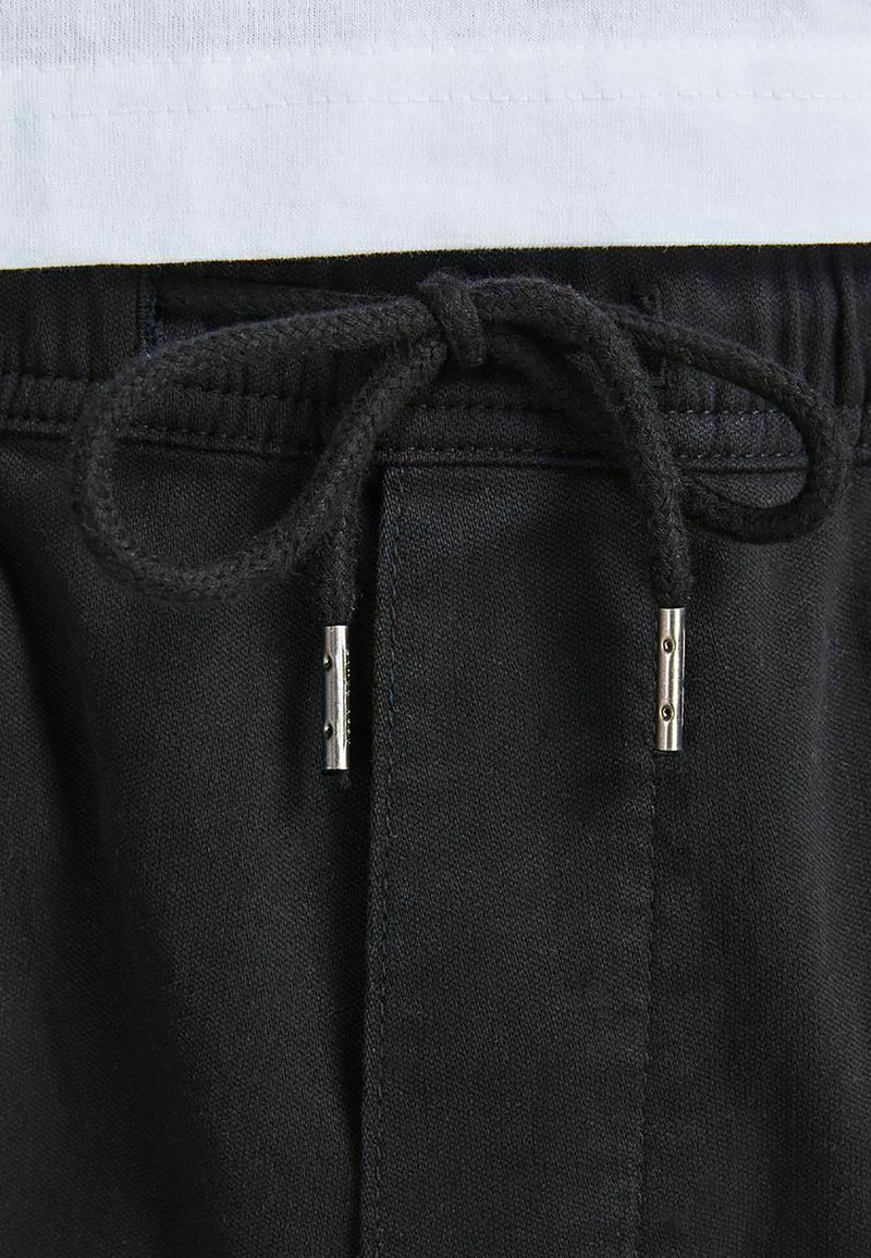 Herren Trainingsanzüge | Jack & Jones ACE BONDI TAPERED AKM Jogginghose black/schwarz - ME60192 Herren Trainingsanzüge | Jack & Jones ACE BONDI TAPERED AKM Jogginghose black/schwarz - ME60192