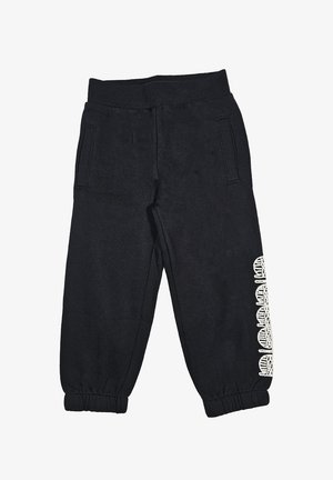 Pantaloni sportivi neri realizzati in un tessuto testurizzato, con vita a coste, tasche laterali e dettagli bianchi decorati lungo una gamba.