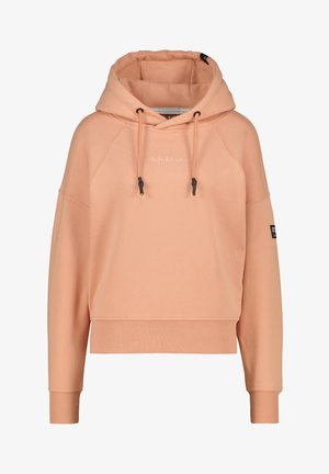 Haut court de couleur pêche avec cordons, manches longues, poignets et ourlet côtelés, et texte blanc brodé sur la poitrine.