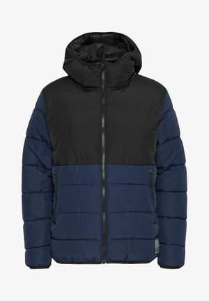 Veste rembourrée avec une partie supérieure noire et une partie inférieure bleu marine. Comprend une capuche, une fermeture éclair et deux poches latérales. Texture lisse et détails cousus.