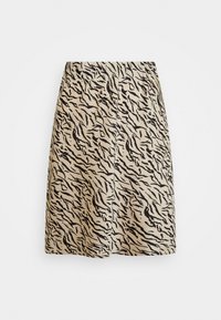 Beige skirt featuring a black wavy tiger stripe pattern, structured design, mid-thigh length, and smooth textured fabric.