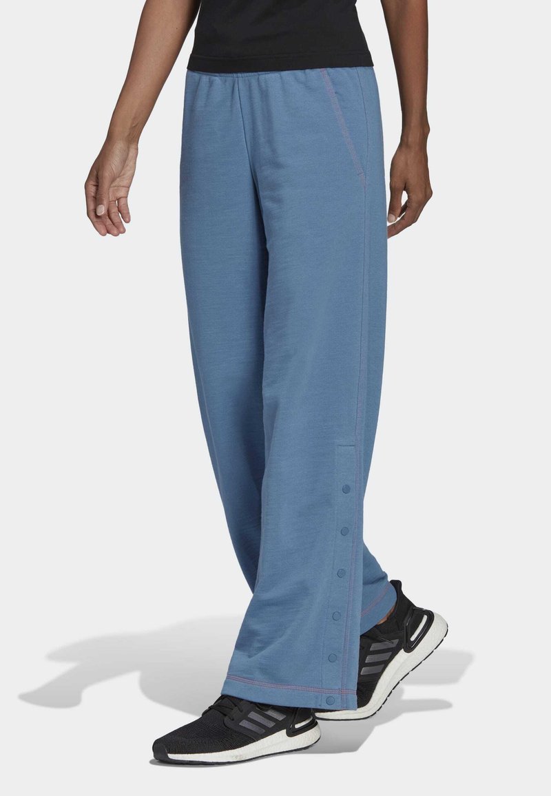 adidas Sportswear SUPER Trousers altered blue/blue Zalando.co.uk