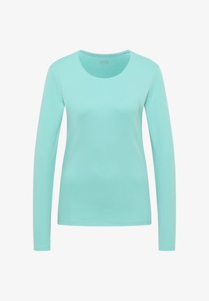 Lyseblå langærmet skjorte lavet af blødt materiale med rund halsudskæring og tætsiddende pasform. Simpelt design, ingen synlige mønstre eller detaljer.