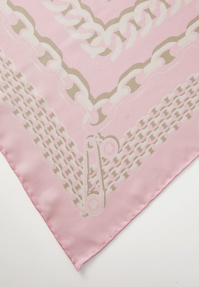 Square pink silk scarf featuring a chain-like pattern in white and beige, with a decorative safety pin detail at one corner.