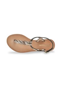Flat sandal with a tan leather base, featuring a braided metallic strap. Buckle closure. Minimalist design with rounded toe.
