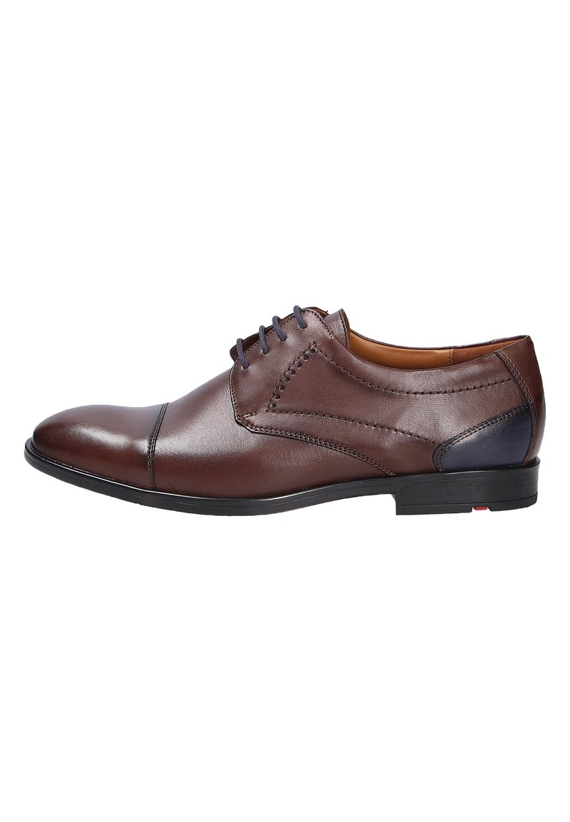 Brown leather dress shoe with a smooth finish, rounded toe, and contrasting dark blue heel. Features stitch accents and five-eyelet lacing.
