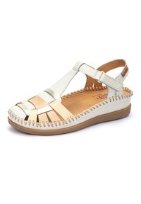 Sandalias de mujer con parte superior de cuero blanco, con correas beige, diseño de punta abierta y costuras decorativas a lo largo de la suela. Base plana y acolchada.