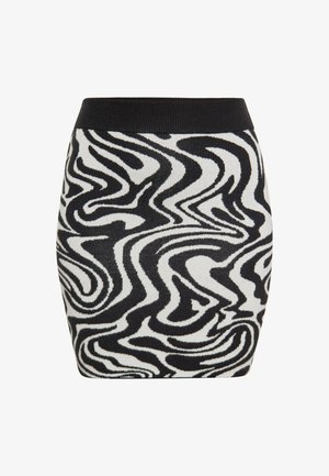 Mustvalge mustriline kudumini seelik, millel on laineline, abstraktne disain ning ühtlane must elastne vöökoht. Sile tekstuur.