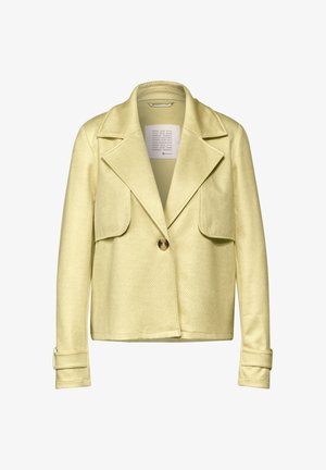 Veste jaune clair en chevrons avec un col à revers, deux poches avant, fermeture à bouton unique et sangles de poignet réglables.