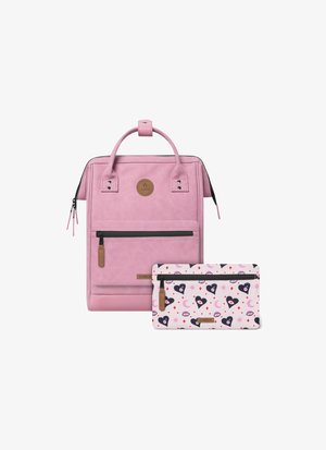 Pink faux leather backpack with top handle, front zip pocket; includes a patterned pink pouch with hearts, eyes, and crescent moons.
