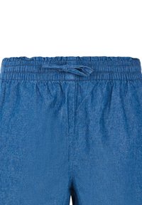 Blå denim bukser med elastisk talje, der har en bindebåndslukning. Stoffet har en glat tekstur og en ensartet farve.