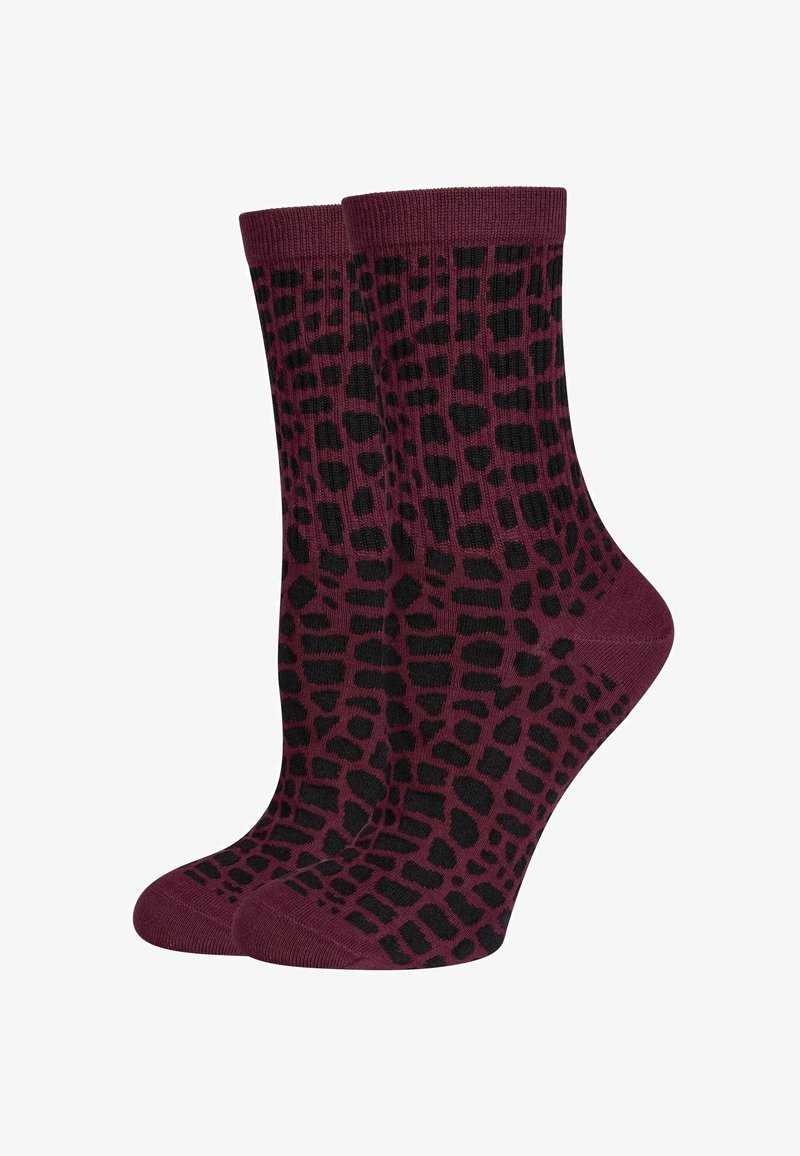 Bordeauxfarbene Socken mit einem schwarzen Tiermuster. Gerippte Bündchen und eine glatte Textur erhöhen Haltbarkeit und Komfort. Design in mittlerer Schafthöhe.