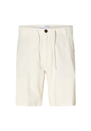 Heleda beežid lühikesed püksid, mis on valmistatud pehmest kangast, koonuspaelaga, esi taskutega ja kontrastse pruuni nööbiga.