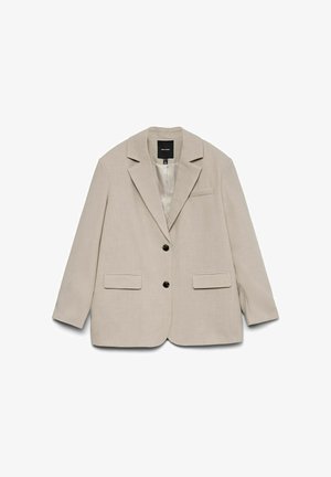 Bēša bleizeris ar iekļautu atkāpi, divām priekšējām kabatām, vienu krūšu kabatu un melniem pogām. Izgatavots no struktūras auduma, ar gludu iekšējo odere.