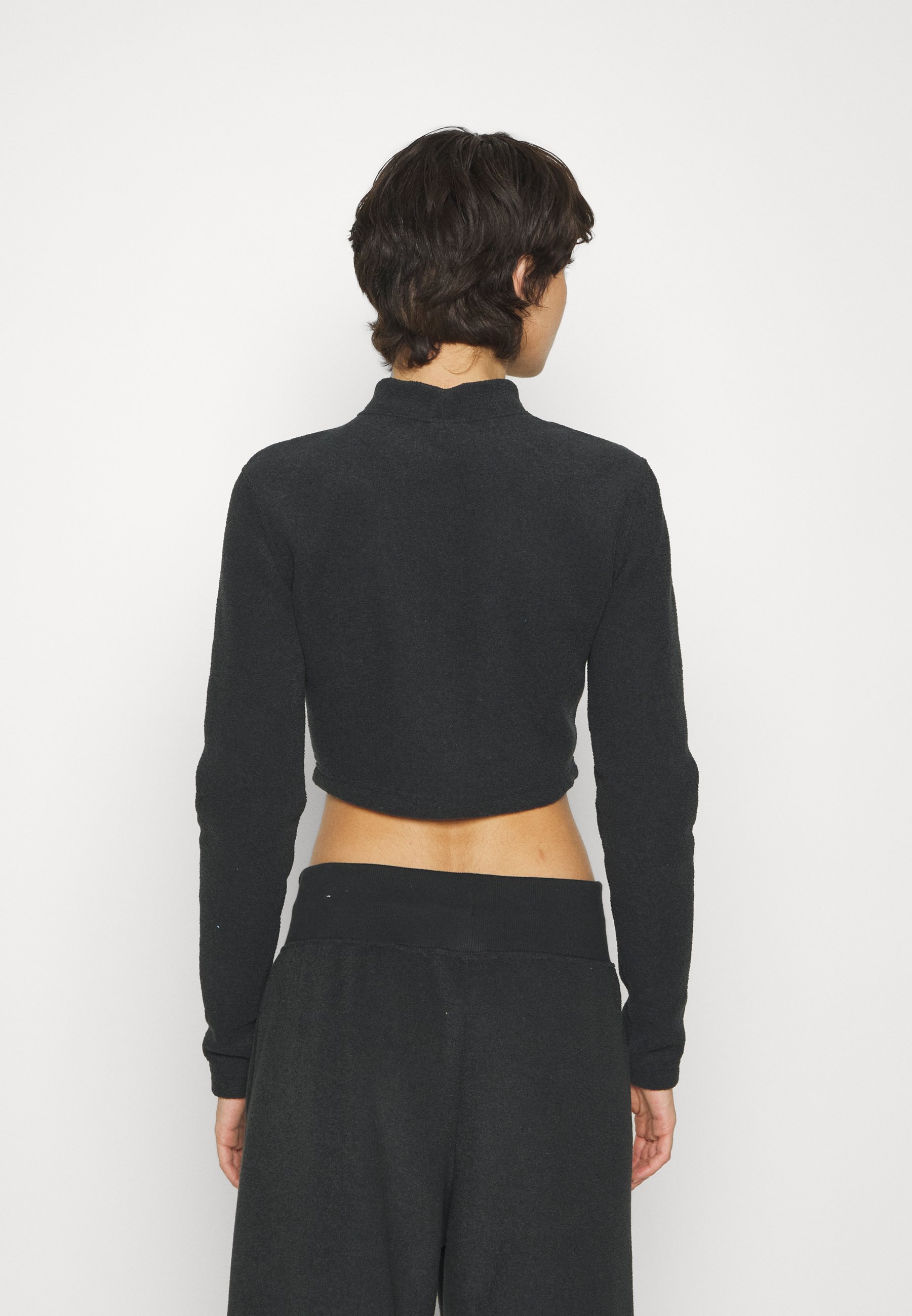 nike sherpa fleece crop top