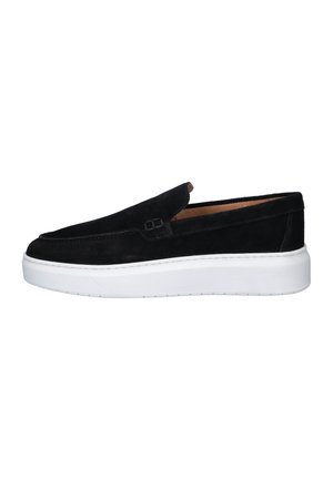 Black suede slip-on shoe with white thick rubber sole, low heel, and rounded toe, viewed from the side on a white background.