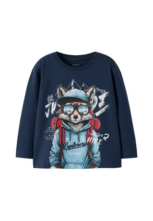 Navy long-sleeve t-shirt featuring a fox graphic wearing sunglasses and a blue hoodie with red backpack accents and outdoor-themed text.