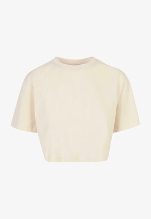 Geknipt t-shirt van zachte stof, met korte mouwen, een ronde halslijn en een lichtbeige kleur met een gladde textuur.