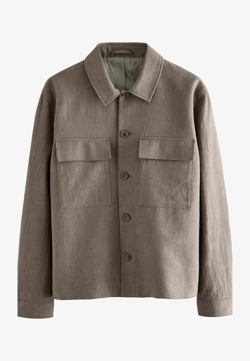 Pruun linane jakk, millel on krae, kaks esikäkkide ja nööbid ees. Tekstureeritud kangas, millel on veidi vabam istuvus.