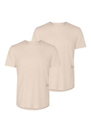 Dwie gładkie beżowe koszulki z krótkim rękawem i okrągłym dekoltem nałożone na siebie, prezentowane na białym tle.