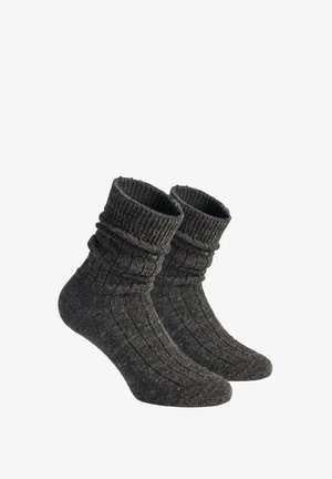 Grau-braune gestrickte Socken mit gerippter Textur, ausgestattet mit einem umgeschlagenen Bund und einer engen Passform, designed für Komfort und Wärme.