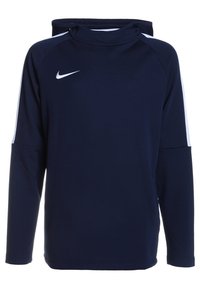 Felpa con cappuccio a maniche lunghe di colore blu navy, realizzata in tessuto morbido, con cappuccio regolabile tramite un cordino, strisce bianche sui lati e un piccolo logo bianco sul petto.