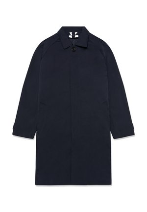 Laivastonsininen takki, joka on valmistettu sileästä kankaasta, suoralla leikkauksella, kauluksella, yhdellä napin suljennalla ja kahdella sivutaskulla.