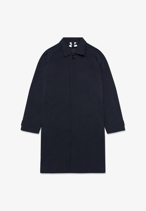 Laivastonsininen takki, joka on valmistettu sileästä kankaasta, suoralla leikkauksella, kauluksella, yhdellä napin suljennalla ja kahdella sivutaskulla.