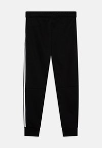 Nike Sportswear TECH - Donji dijelovi trenirke - black/reflective silver
