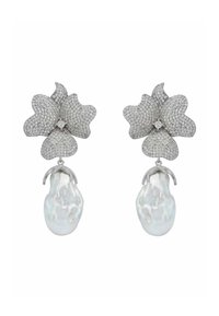 Silver earrings shaped like orchids, adorned with pave diamonds. They feature large, iridescent pear-shaped pearls hanging below.