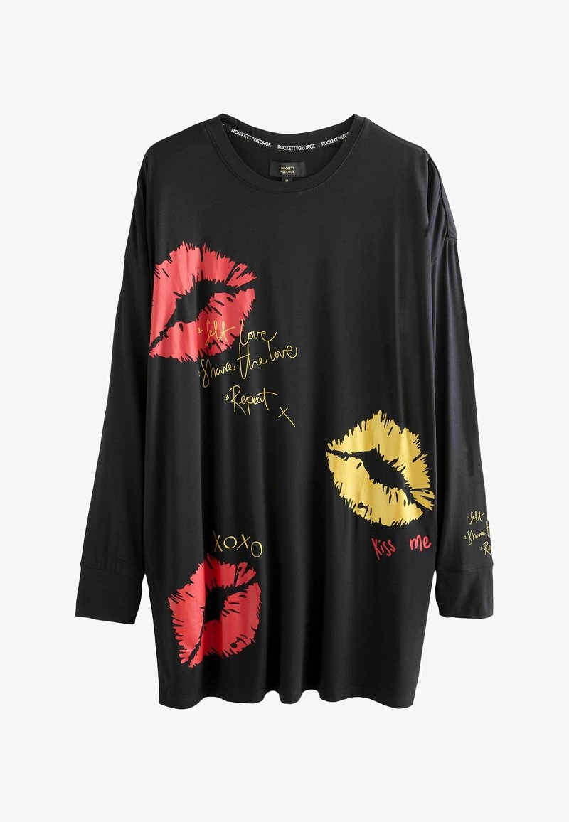 Must mustärgiga pikkade varrukatega T-särk, millel on punased ja kollased huulemustrid ning kuldsed tekstifraasid, lõdva istuvuse ja pehme tekstuuriga.