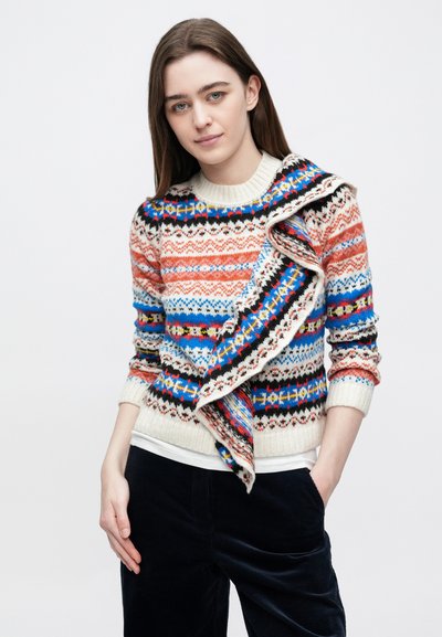 Daudzkrāsains adīts džemperis ar zigzaga un ģeometriskiem rakstiem, salokotā apkakle un ribotas aproces no mīkstas dzijas.