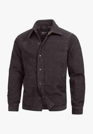 Black corduroy jacket featuring a button-up front, two front pockets, a pointed collar, and ribbed cuffs. Textured fabric with horizontal lines.