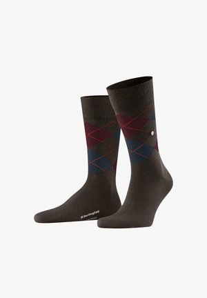 Pair of dark brown crew socks with burgundy, navy, and gray argyle pattern and small white brand logo near ankle.