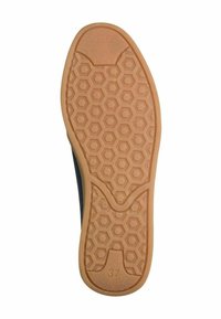 Rubber shoe sole with a hexagonal pattern, featuring a smooth tan surface and a size label "37" near the heel.